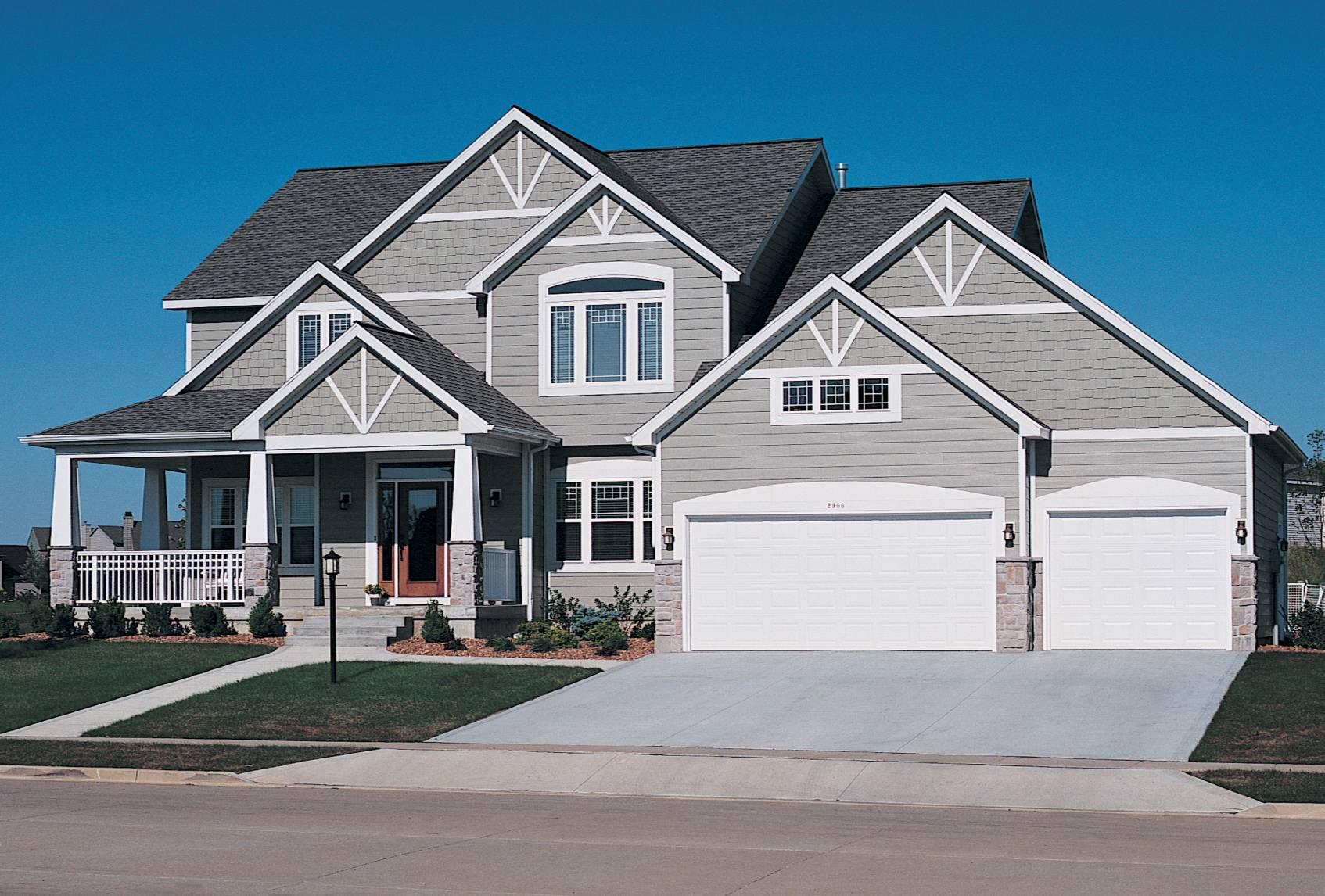 Beautiful home with garage doors